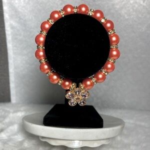 Pearl bracelet with charm